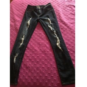 Dark blue ripped jeans